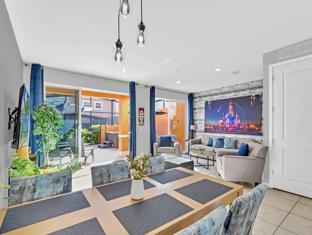 Dining area with view of living room, TV and outdoor patio
